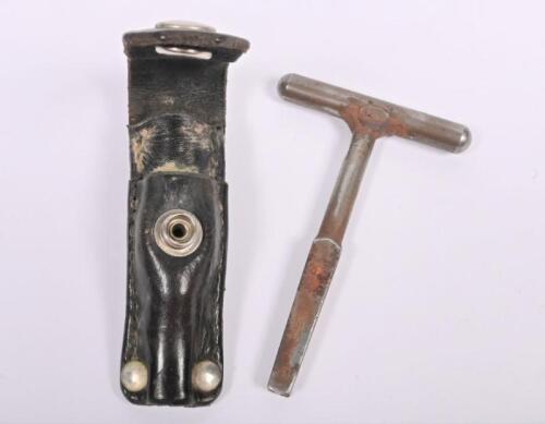 VICTORIAN RAILWAYS: An original carriage H key in leather belt holder