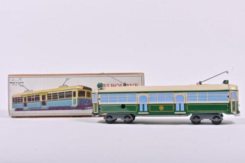 KNOX & FLOYD: A clockwork pressed tin toy of a W Class Tram by Knox & Floyd
