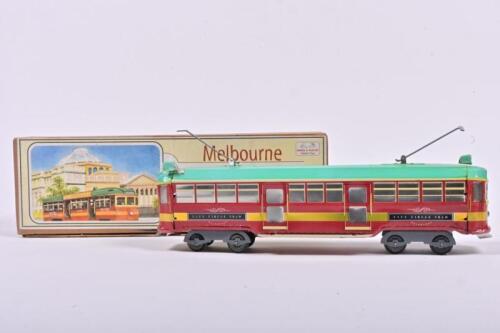 KNOX & FLOYD: A clockwork pressed tin toy of a Class City Circle Tram by Knox & Floyd in original box