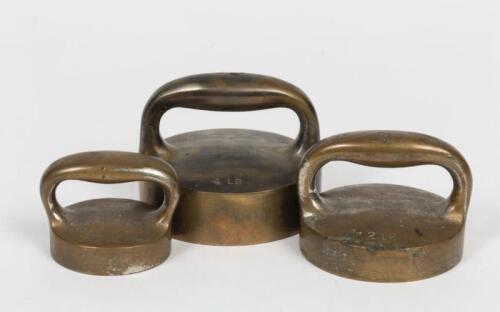WEIGHTS: A set of three antique brass weights, 1, 3 and 4 LBS