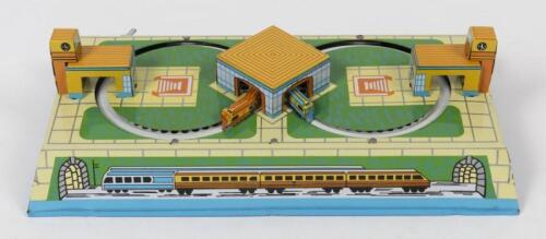 NOVELTY TRAIN SET: A novelty production lithograph printed tin train set in box, 24cm long