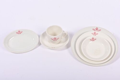VICTORIAN RAILWAYS: A set of ceramic plates and a cup and saucer marked with Victorian Railways crest