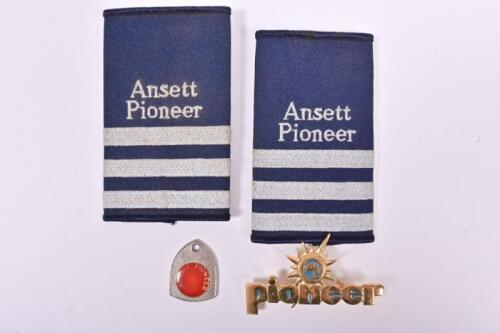 ANSETT PIONEER: A set of two cloth epaulettes and two stick pins