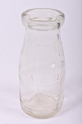 MILK BOTTLE: A glass MBR half pint milk bottle