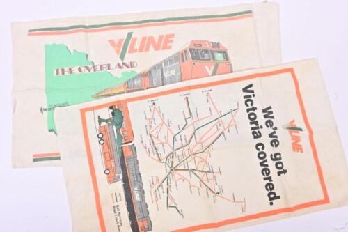 V/LINE: Two V/Line tea towels, one of the V/Line network and the other featuring the Overland train