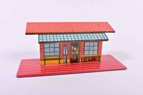 TOY STATION: A British made tin station toy