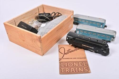 LIONEL TRAINS: A Lionel Trains electric train set comprising, track, controller, two Pullman carriages locomotive and tender and instruction manual