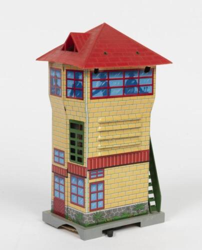 SIGNAL BOX: A Japanese tin model signal box with electric lighting connector by Nikko Gangu Kogyo, 21cm high