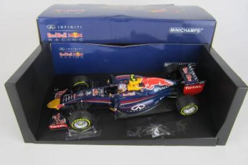 RENAULT RB10: A 1:18 scale 2014 Infiniti Red Bull Racing RB10 by Minichamps. As driven by Daniel Riccardo.