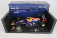 RENAULT RB10: A 1:18 scale 2014 Infiniti Red Bull Racing RB10 by Minichamps. As driven by Daniel Riccardo.