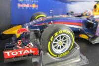 RENAULT RB10: A 1:18 scale 2014 Infiniti Red Bull Racing RB10 by Minichamps. As driven by Daniel Riccardo. - 5