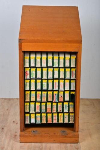 VICTORIAN RAILWAYS: An oak ticket cabinet with array of undated V/Line EDMONDSON tickets, focus on Warrnambool Line, 80cm high, 36.5cm wide, 35cm deep