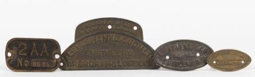 MAKERS PLATES: A group of four machinery makers plates, the largest 19cm high, 9.5cm wide