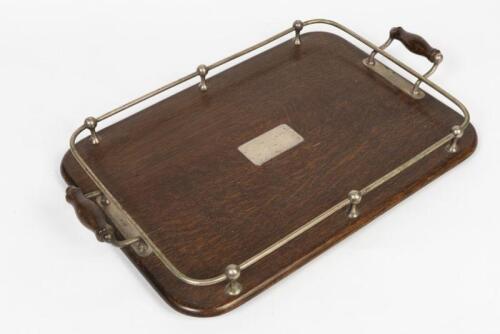 VICTORIAN RAILWAYS: A EPNS oak and silverplate serving tray as used on the Victorian Railways, 51.5cm across the handles