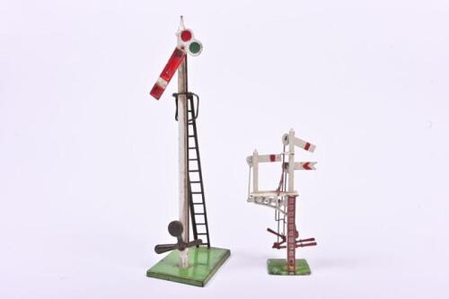 SIGNAL: A O gauge scale model of a lower quadrant home signal and a crescent model of a cantilever with three signals