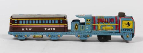 JAPANESE TIN TRAIN: A 1960s Japanese friction driven lithograph printed tin 'Swollow Express' toy train, marked made in Japan and SZK in a diamond, 24cm long