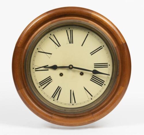 STATION CLOCK: A reproduction oak cased station clock with key and weight, 42cm diameter