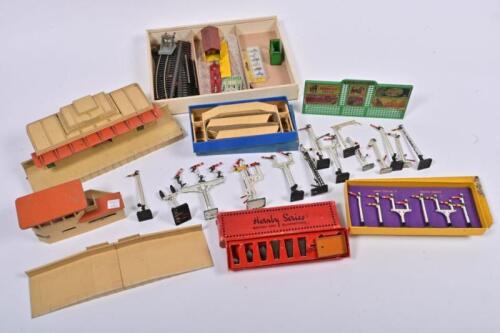 DIORAMA PARTS: A collection of HO gauge diorama parts, including a Horby Art Deco station, track, signals and people