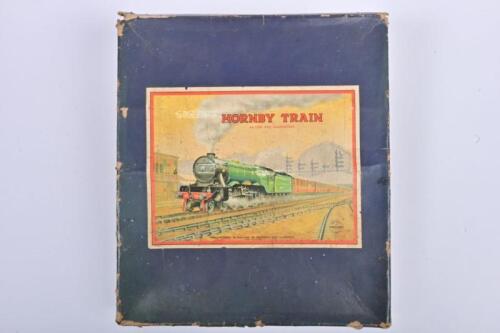 HORNBY: A Hornby O gauge LMS No. 501 passenger train set, comprising an 0-4-0 locomotive 5600 and tender, two 1st/3rd coaches, a guard's van and track, in original box showing signs of wear, the trains with some oxidation