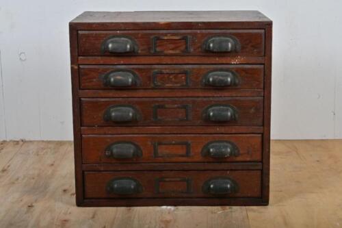 TICKET DRAWERS: A small early 20th century chest of five filing drawers, each drawer with dividing sections for tickets, 43cm high, 45cm wide, 32cm deep