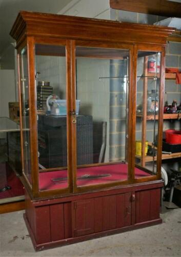 DISPLAY CABINET: A large early 20th century walnut and glass display cabinet on later stand, with three glass shelves, 199cm high, 145cm wide, 82cm deep
