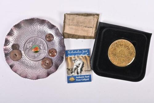 WWII: A collection of WWII related items including 'The Sands of Gallipoli' medallion, a name badge and buttons