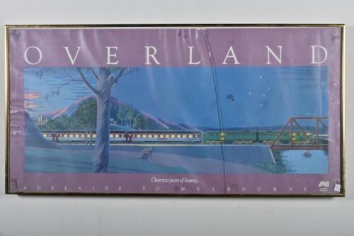 AUSTRALIAN NATIONAL AIRWAYS: A promotional poster for the Overland train, framed and glazed, 50 x 99cm overall