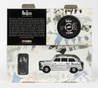THE BEATLES: A NOS 1:43 scale Corgi 'The Beatles Collection' News paper Taxi & figurine, special edition