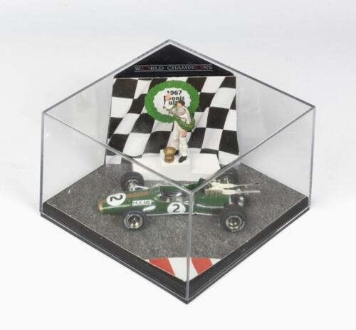 REPCO BRABHAM: A NOS Limited Edition 1:43 scale Vitesse Repco Brabham BT24 - World Champion 1967 & Dennis Hulme figurine with CoAL