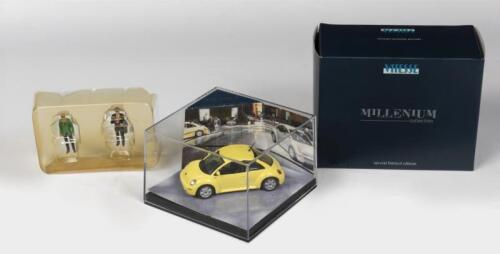 VOLKSWAGEN: A NOS Limited Edition 1:43 scale Vitesse Millennium Collection Volkswagen New Beetle 1999 & Two figurines with CoA