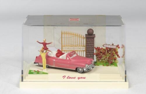 CADILLAC: A NOS 1:87 scale Bush Pink Cadillac 1953