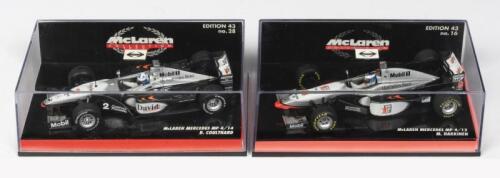 MCLAREN - MERCEDES: Two NOS 1:43 scale Mclaren Mercedes including a MP4/12 - M.Hakkinen #9 & MP4/14 - D.Coulthard #2