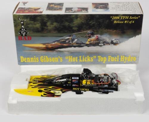 TOP FUEL HYDRO: A NOS 1:18 scale BAD, Dennis Gibson's "HOT LICKS" Top fuel Hydro and his Drag Boat Trailer, including a boat and display stand together with a drag boat trailer