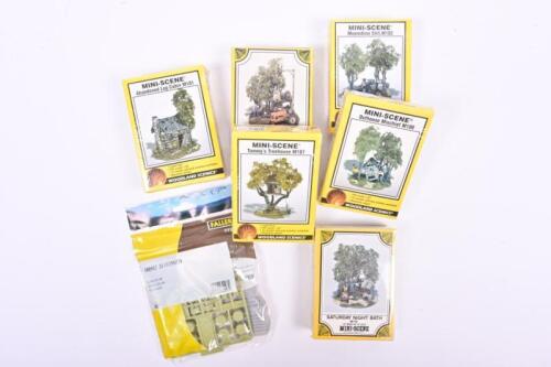 WOODLAND SCENICS: A NOS Sealed group of six assorted woodland mini scenes & a pack of bales of hay