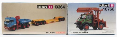 KIBRI: Two NOS Sealed HO scale model rail vehicles including a truck with trailer and a tractor