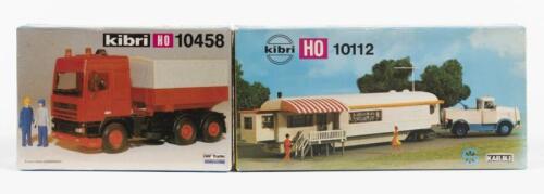 KIBRI: Two NOS Sealed HO scale model rail vehicles including a truck with trailer and a truck with caravan