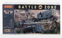 HORNBY: A NOS Sealed HO scale Electric train set including Class 08 locomotive, 2 transporter wagons, oval tracks with siding, train controller, 2 tanks,missile launcher and more, Overall dimensions 170 cm x 101 cm