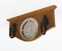 VICTORIAN RAILWAYS: A wooden plaque with two cast iron clothes hooks ex. Newport Workshops and a central air vent from a steel bodied carriage, 23cm high, 50cm wide, 8cm deep