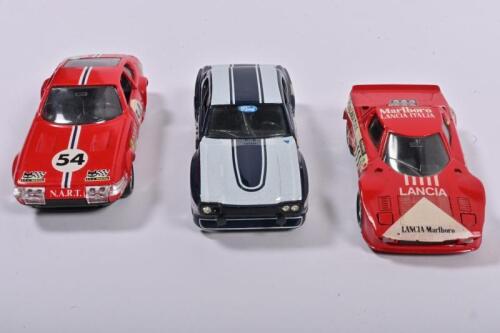 EUROPEAN DIECAST: Three 1:43 scale models by solido. 1973 Ferrari 365 GTB/4 (No.16), 1974 Ford Capri 2600 RV (No.26) & 1974 Lancia Stratos (No.27)