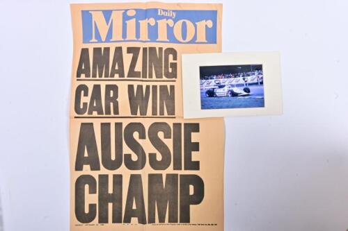JONES: Two items relating to Alan Jones. 'Daily Mirror - 'AMAZING CAR WIN AUSSIE CHAMP' poster, produced after Alan Jones won the Canadian Grand Prix and the 1980 Formula 1 World Championship