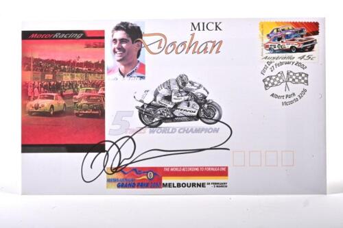 DOOHAN: A commemorative 'FOSTER'S AUSTRALIAN GRAND PRIX 2002 First Day envelope featuring Mick Doohan - '5 TIMES WORLD CHAMPION'. Envelope signed by Mick Doohan
