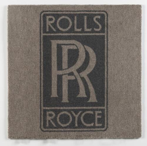 ROLLS ROYCE: carpet tile with RR insignia.