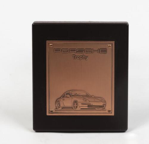 PORSCHE: A factory produced 1990s brass and timber &ldquo;Porsche Trophy&rdquo; plaque featuring the 911 / 993, 13cm high x 11cm wide.