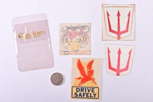 STICKERS: Four 1960s unused stickers including the Neptune Race Team, Esso "Put a Tiger in your tank" and Pegasus "Drive Safe".