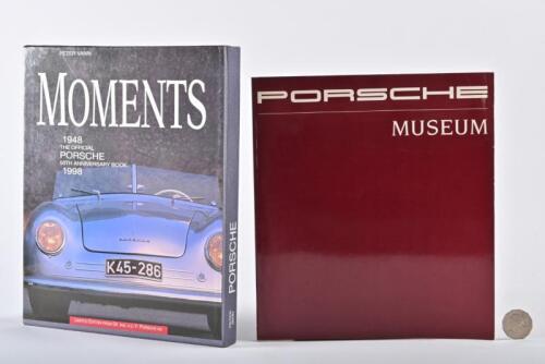 PORSCHE: Two books. 1998 50th anniversary hardback book, "Moments", in slipcase By Peter Vann. Official Porsche Museum catalogue.