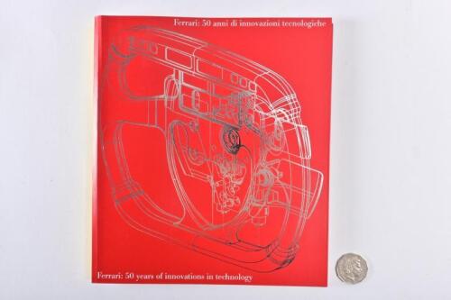 FERRARI: "50 years of innovations in technology", a soft cover book issued by Ferrari.
