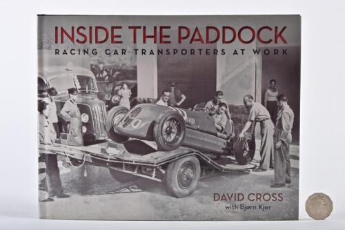 GRAND PRIX/TRANSPORTERS: "Inside The Paddock: racing transporters at work", hardback book by Cross.