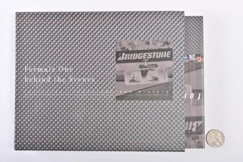 BRIDGESTONE/F1: "Formula One: behind the scenes." Softback book in slipcase.