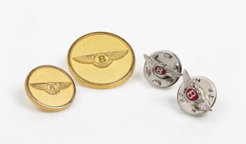 BENTLEY: Four small metal lapel badges.
