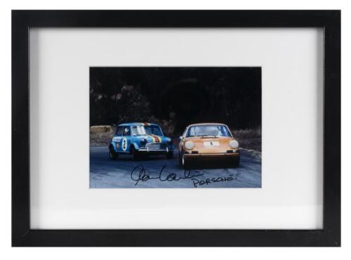 PORSCHE: A racing photograph of Alan Hamilton and Peter Manton cornering, signed "Alan Hamilton Porsche", framed